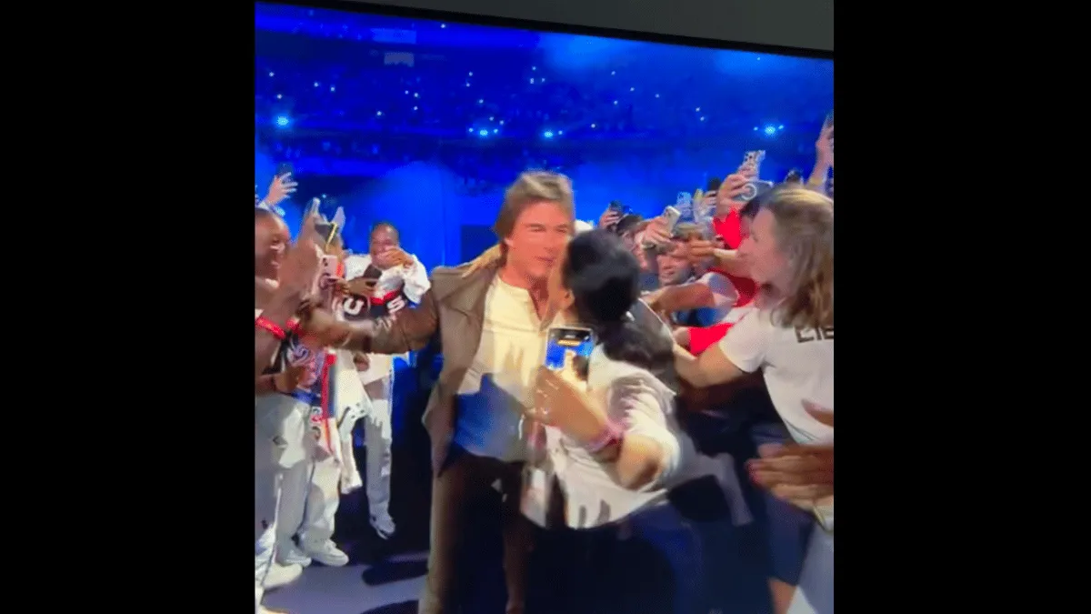 tom-cruise-female-fan-loses-control-grabs-and-kisses-actor-at-paris-olympics-2024-closing-ceremony-viral-video
